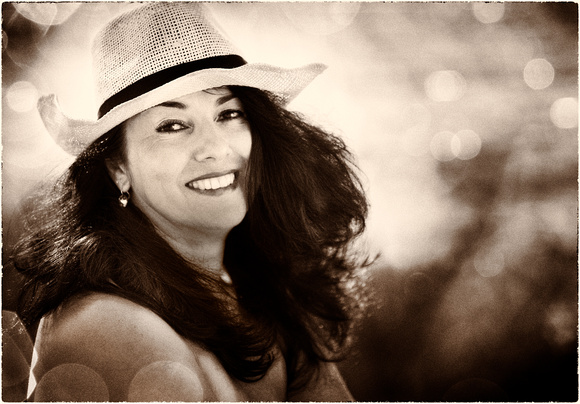 Portrait with long black hair and straw hat -9735-6