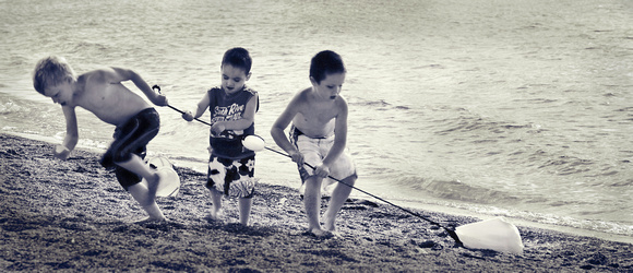 PH826a three children at beach work 1 -12x5 -4583.jpg
